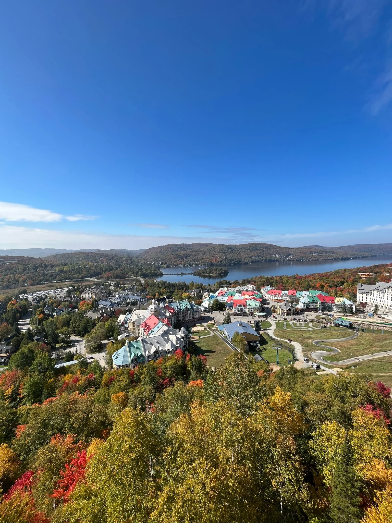 Mont Tremblant autumn colours, Lac Tremblant in the background, Pedestrian village below